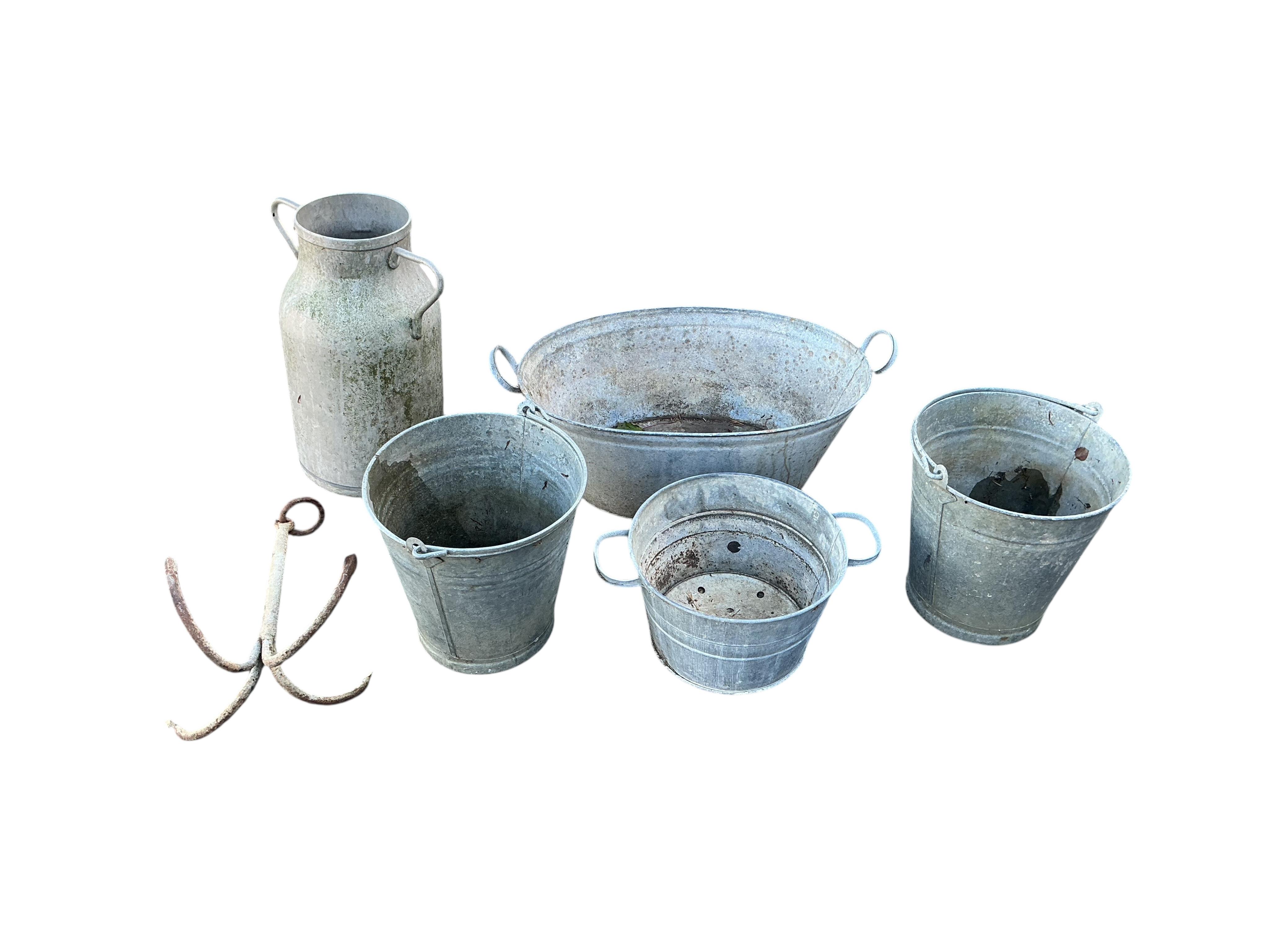 Five galvanised containers, largest width 72cm, a metal anchor and a small rattan top garden table